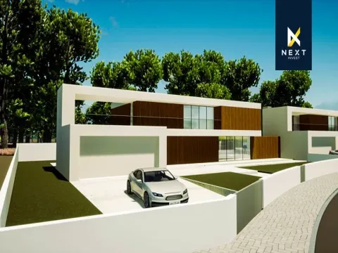 Moradia Bifamiliar T4 de Design Distinto com Terraço Exclusivo e Jardim Vertical