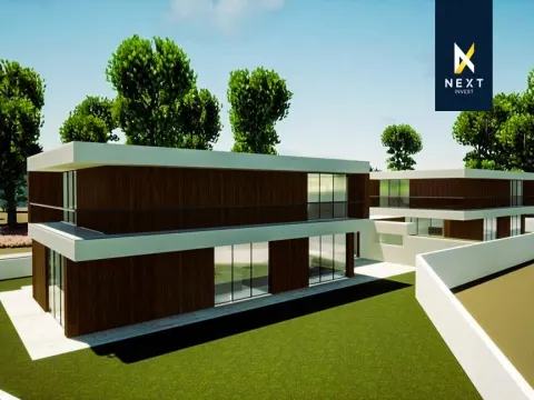 Moradia Bifamiliar T4 de Design Distinto com Terraço Exclusivo e Jardim Vertical