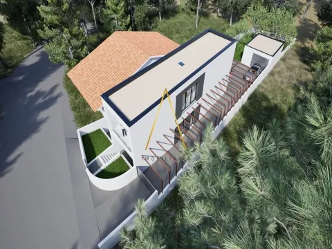 A moradia isolada V2, inserida num lote de 252 m²