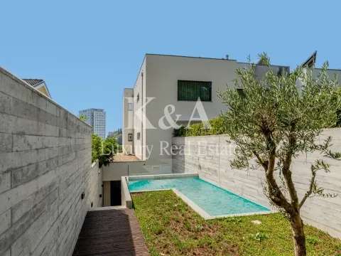Moradia T4 com jardim e piscina junto ao Parque da Cidade
